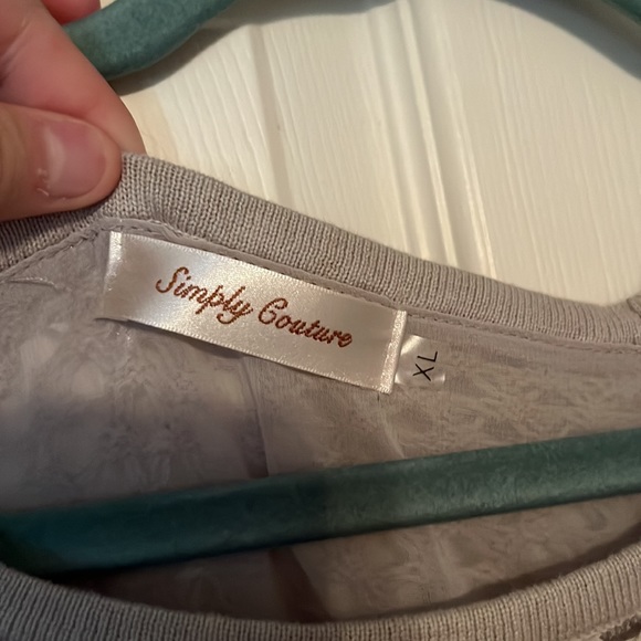 Here is a dress/shirt that you can wear leggings under - Picture 4 of 4